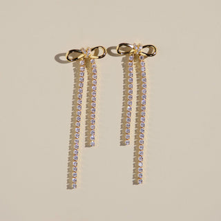 Gold Long Crystal Bow Drop Studs - Nickel & Suede