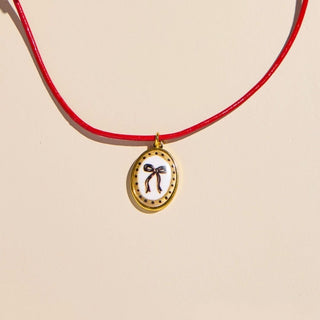Oval Bow Hand Painted Enamel Charm Necklace with Leather Cord - Nickel & Suede