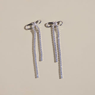 Silver Long Crystal Bow Drop Studs - Nickel & Suede