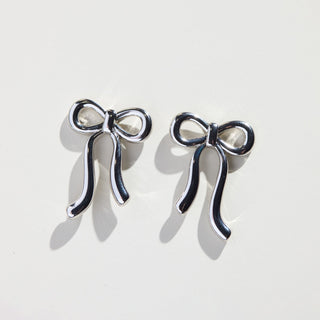 Silver Vintage Bow Studs - Nickel & Suede